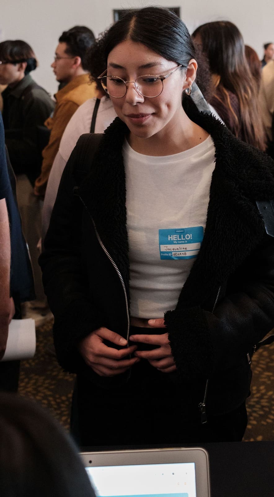 A woman about to be interviewed by a camp