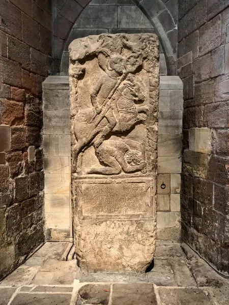 Hexham Roman Soldier kicking a subordinate