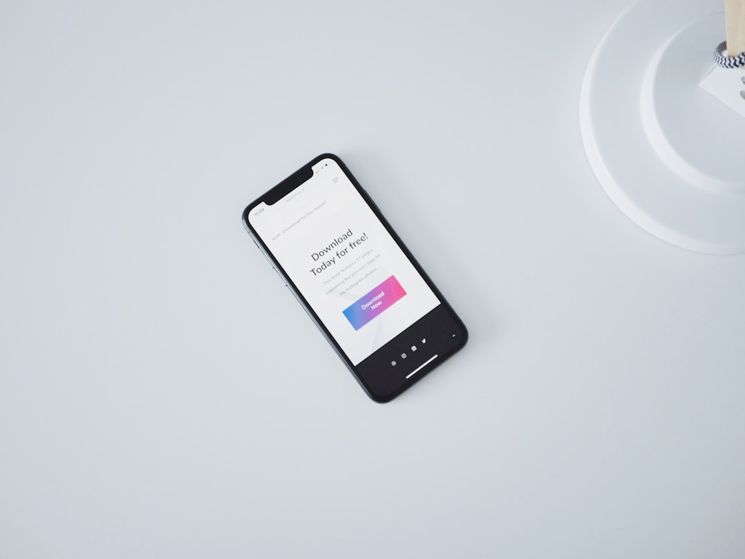Turned on iPhone X on white surface for How to Design Mobile-First Forms That Actually Convert: A Step-by-Step Guide for Small Business Websites