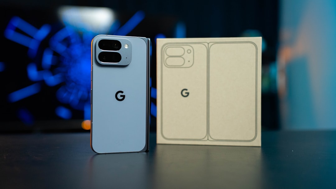 Light blue smartphone next to its packaging for How to Cut Your Google Ads Cost Per Click in Half: A Step-by-Step Quality Score Optimization Guide for Small Businesses