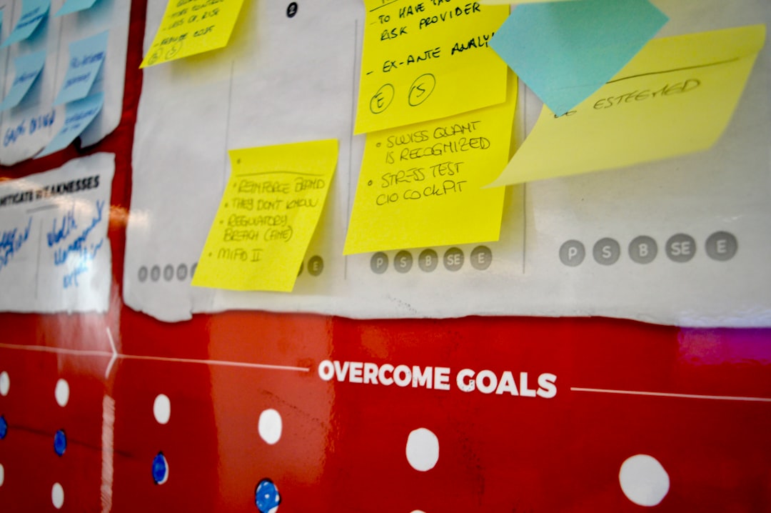 Yellow sticky notes on white and red polka dot textile for How We Organize Client Projects to Meet Tight Deadlines: A Studio Workflow Breakdown