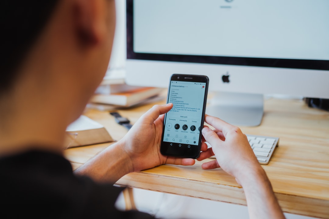 Person holding black android smartphone for "How to Design Mobile-First Forms That Actually Convert: A Step-by-Step Guide for Small Business Websites"