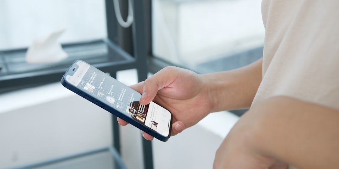 Person holding silver iphone 6 for How to Design Mobile-First Forms That Actually Convert: A Step-by-Step Guide for Small Business Websites