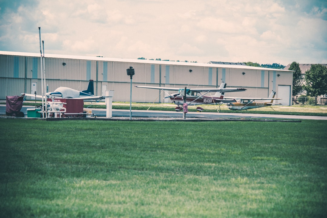 A small plane parked in front of a hangar for How to Optimize Your Google Business Profile to Rank Higher in Local Search Results