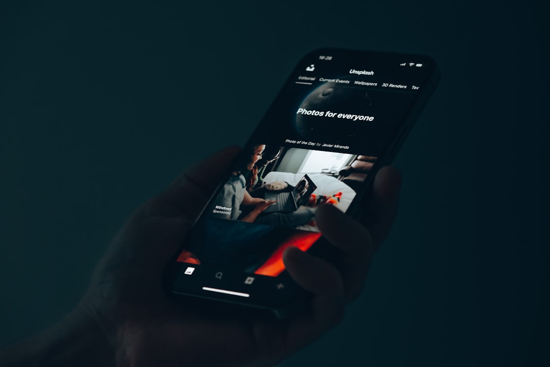 A hand holding a game controller for How Progressive Web Apps Can Help Small Businesses Compete Without Building Native Mobile Apps