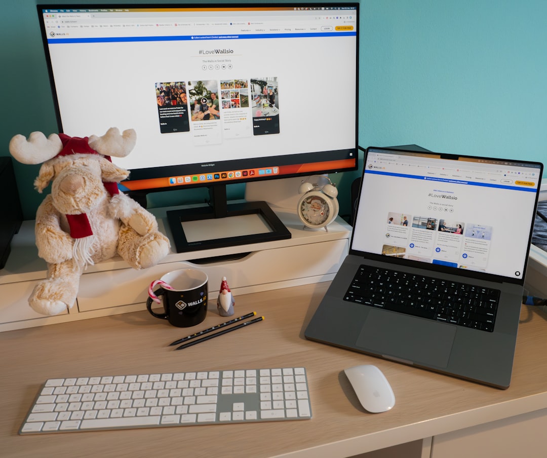 A laptop computer sitting on top of a wooden desk for How to Audit Your Website's Color Contrast for Better Accessibility and Customer Reach
