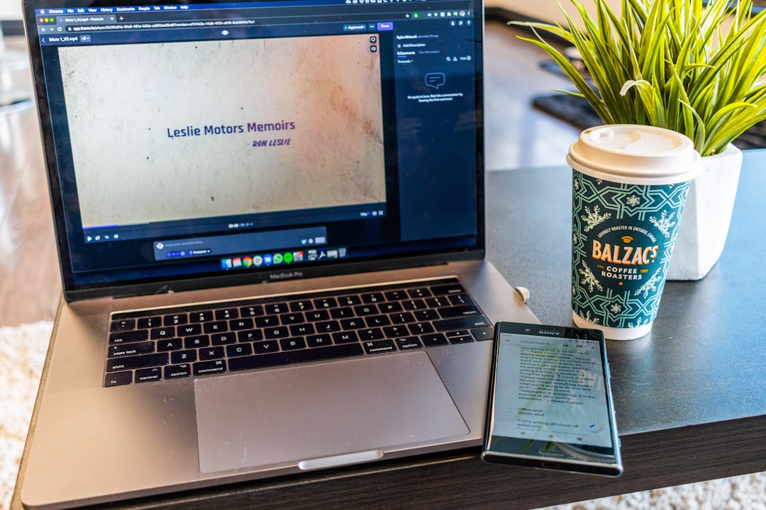 Macbook pro on brown wooden table for How Schiano Studios Helped a Local E-Commerce Brand Increase Website Conversions by 40% in 90 Days