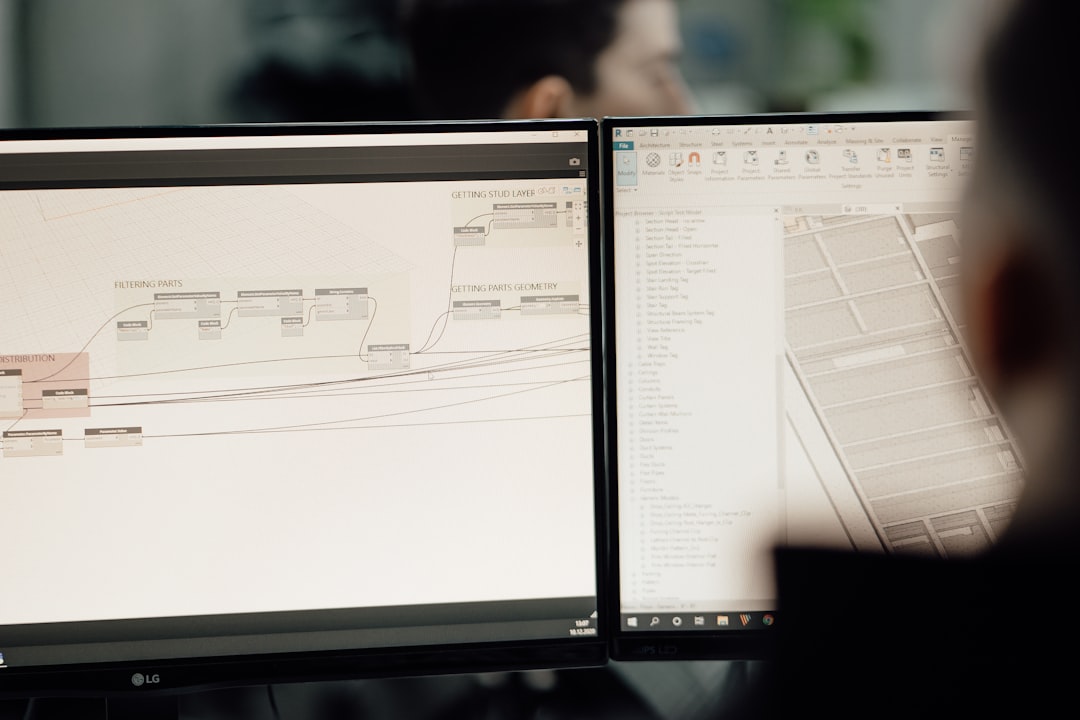 Someone is working on a computer for How We Streamline Client Onboarding: A Behind-the-Scenes Look at Our Project Kickoff Process
