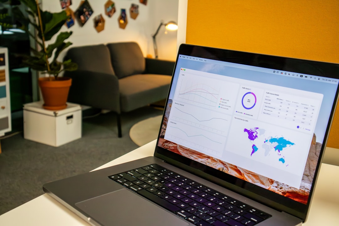A laptop computer sitting on top of a white table for "How to Find Low-Competition Keywords Your Small Business Can Actually Rank For"
