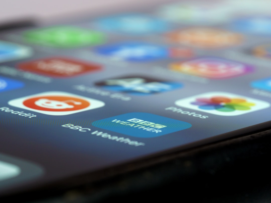 Black android smartphone turned on displaying icons for "How to Repurpose Your Best-Performing Posts Across Multiple Social Platforms Without Looking Repetitive"