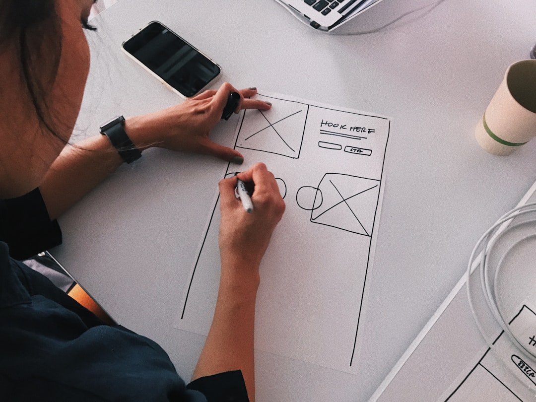 White printer paper on table for How to Segment Your Email List to Increase Click-Through Rates and Sales