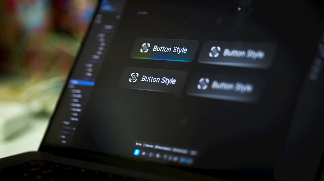 Laptop screen displays four button style options for The Complete Guide to Figma for Small Business Owners: Design Without the Designer