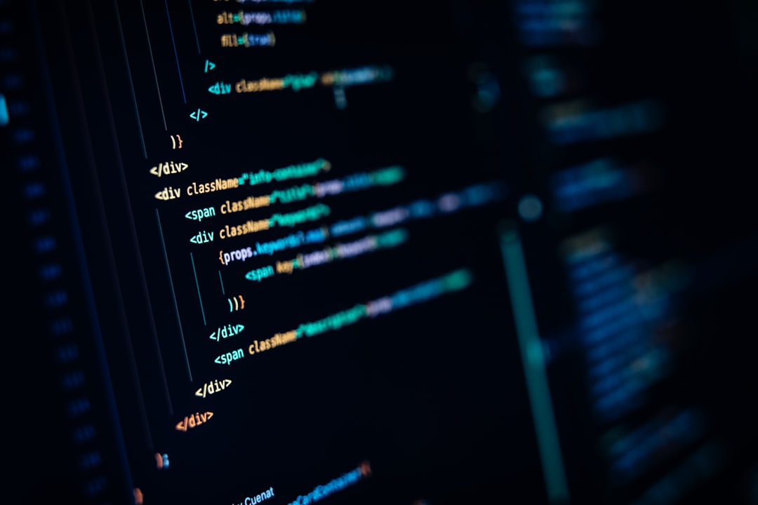 A close up of a computer screen with many lines of code on it for How to Choose Between Node.js and Python for Your Small Business Backend: A Practical Comparison Guide