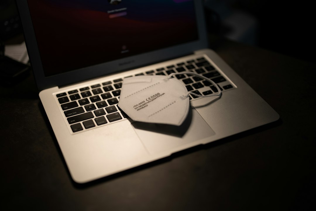 Macbook pro on black table