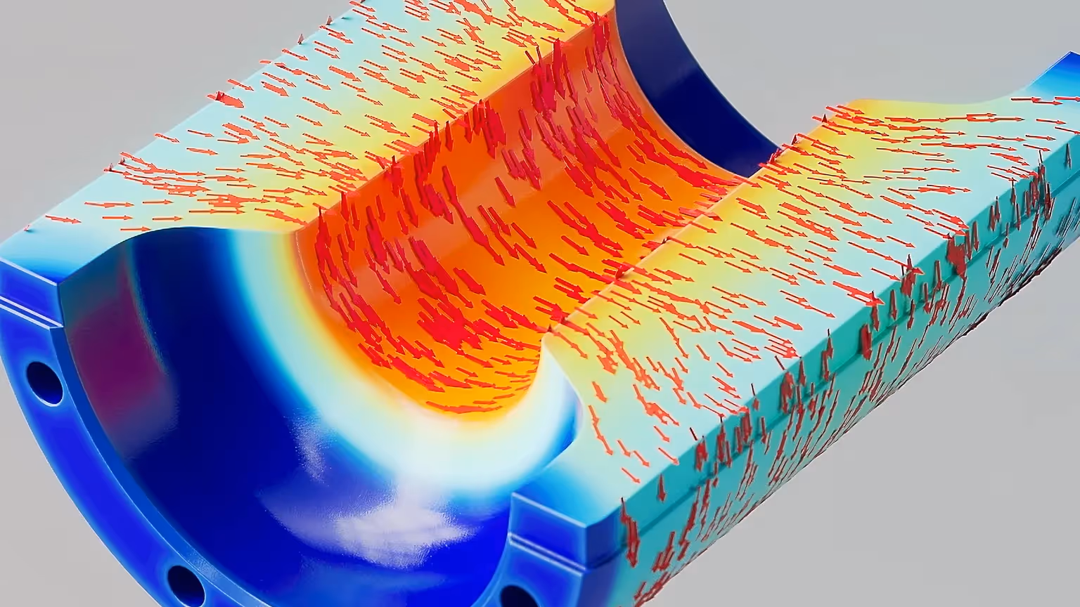 Farbenfrohes 3D-Rendering einer Strömungssimulation in zylindrischer Kammer, rote und orange Muster zeigen Flussintensität, blaue Bereiche markieren kühle Ränder.