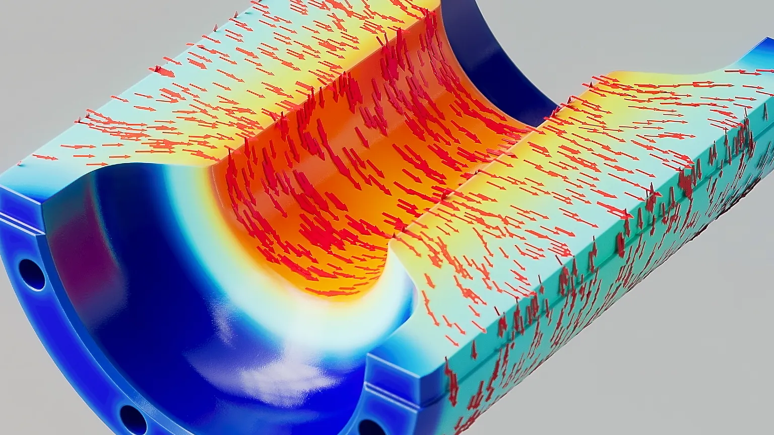 Farbenfrohes 3D-Rendering einer Strömungssimulation in zylindrischer Kammer, rote und orange Muster zeigen Flussintensität, blaue Bereiche markieren kühle Ränder.