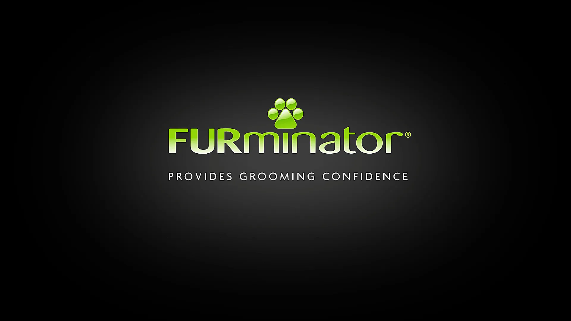 FURminator Logo mit grünem Pfoten-Symbol und Slogan Provides Grooming Confidence auf schwarzem Hintergrund.