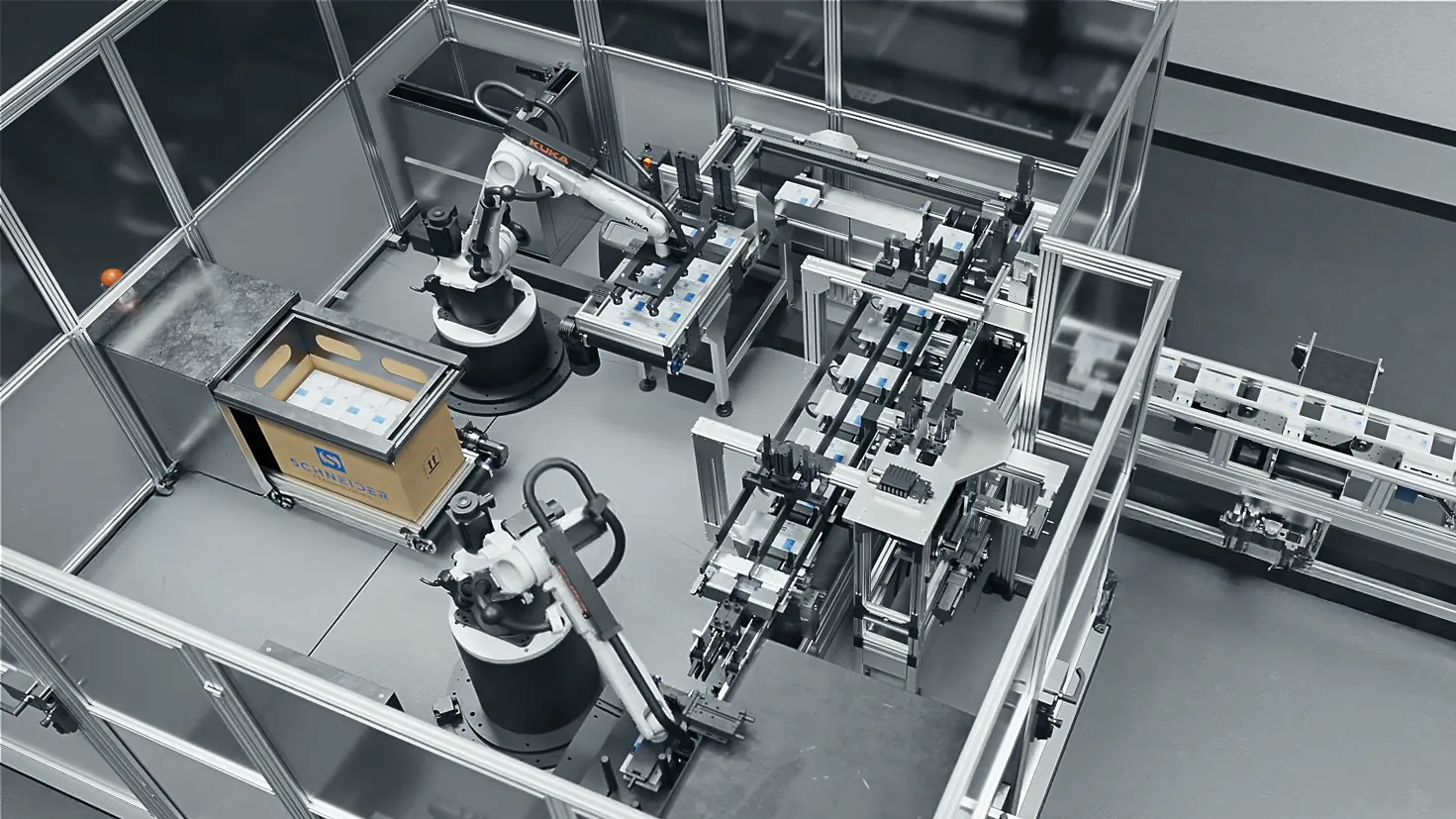 3D-Produktvideo von Schneider Technologies – Roboterzelle mit automatisierter Verpackung für FFP2-Masken.