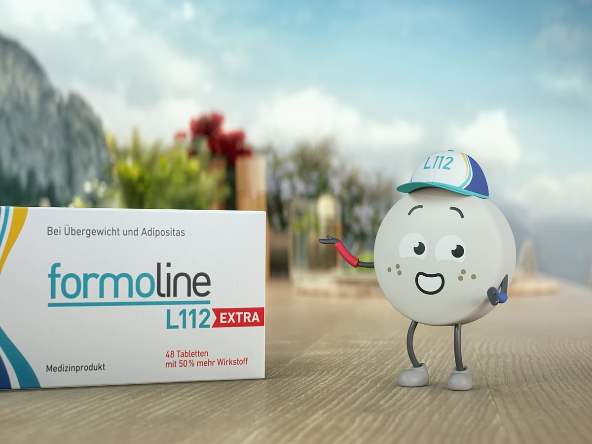 Animierte L112-Tablette zeigt lächelnd auf die formoline L112 EXTRA Packung, TV-Werbung für Certmedica