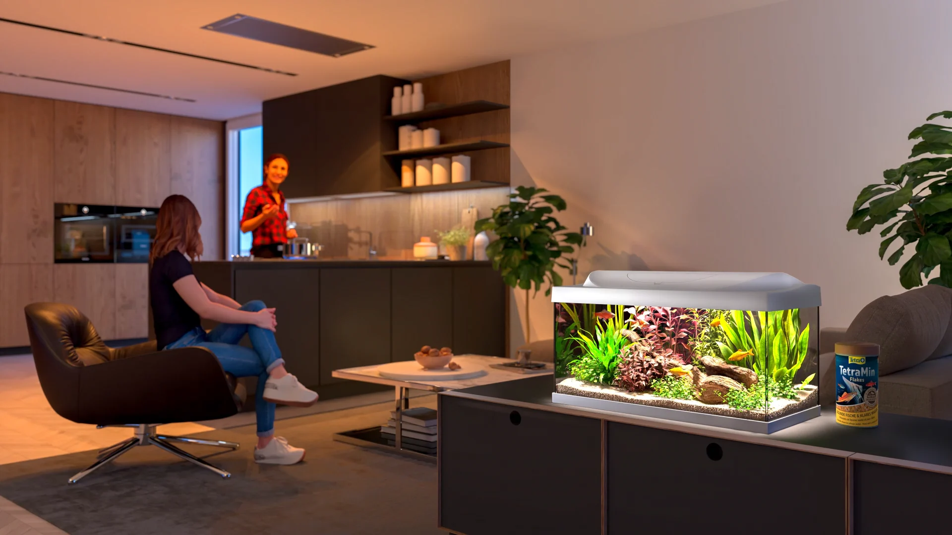 Gerenderter Wohnraum mit offener Küche: Eine Frau sitzt im Sessel, daneben steht das beleuchtete Aquarium auf dem Lowboard