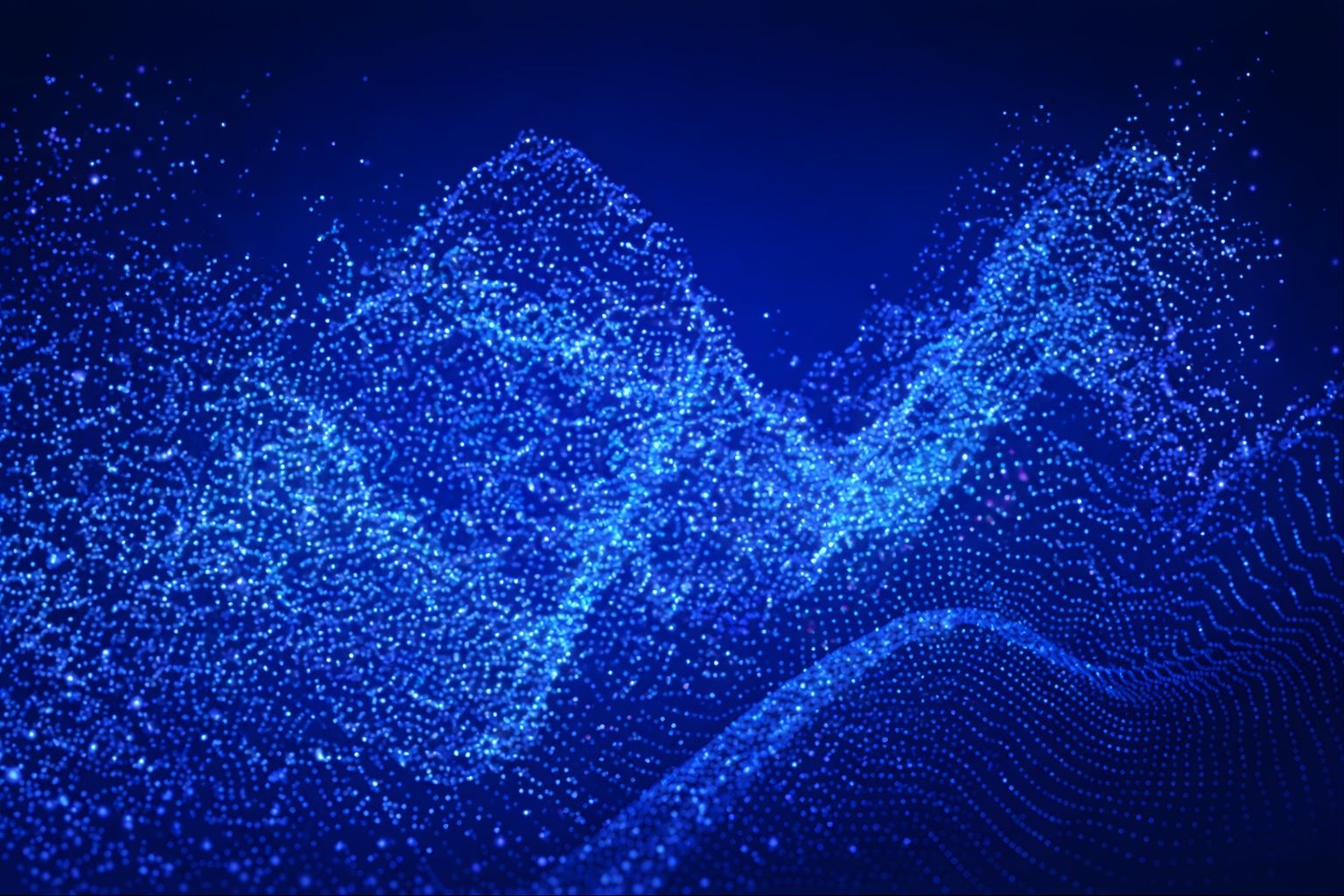 Abstract blue particles forming wave-like patterns on a dark background.