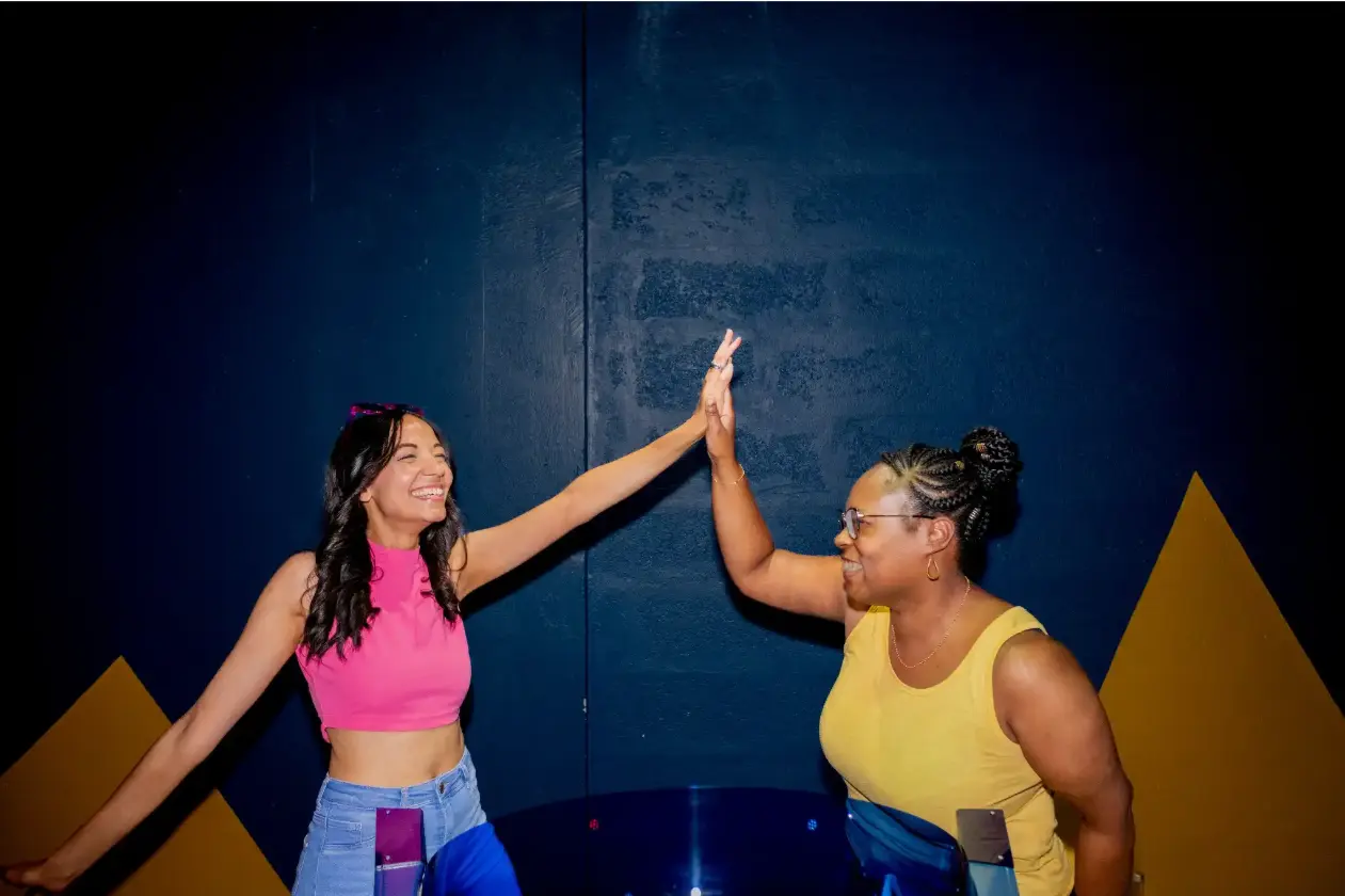 Team building Dubai activity – friends playing The Mole immersive bluff game