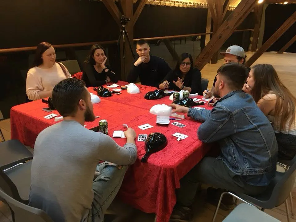 Team building Dubai game night with colleagues playing Mafia bluff game