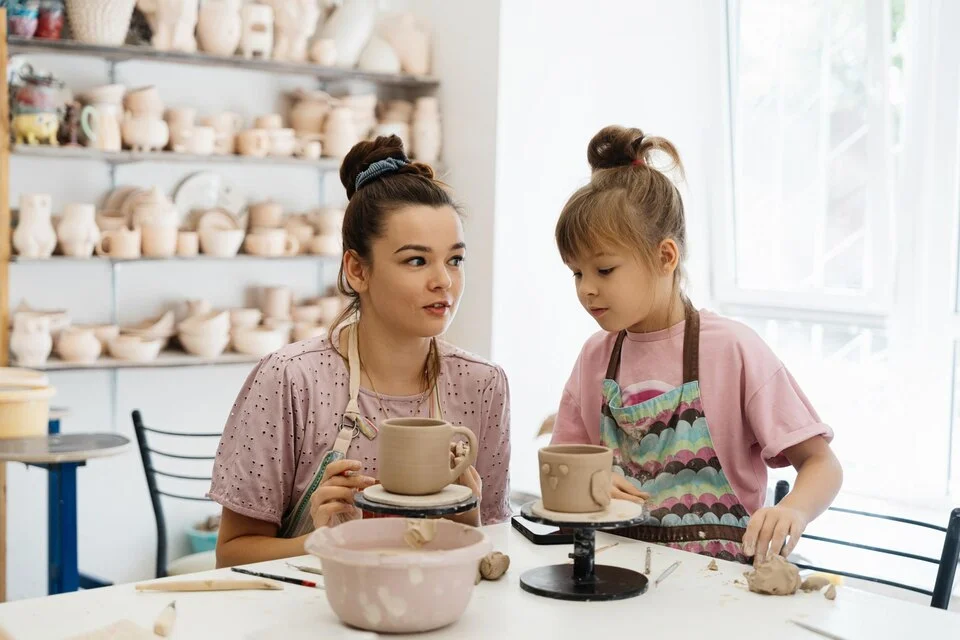 Child doing pottery
