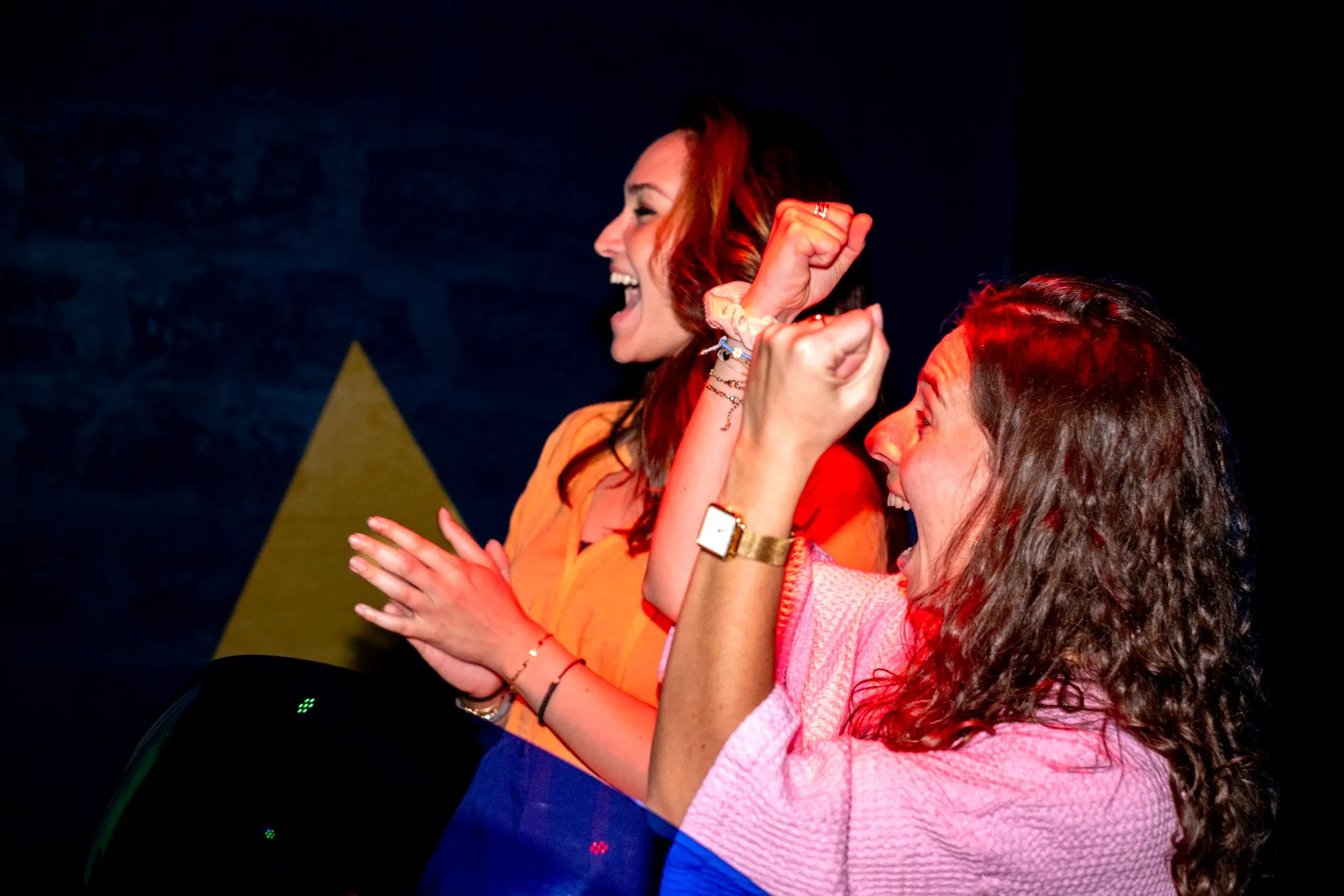 HR team enjoying a game-show style team bonding activity at Quiz Room
