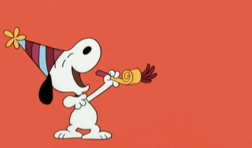 Snoopy celebrating with a party hat and noisemaker on a bright red background â perfect for festive and New Yearâs content.
