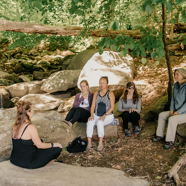 Team walking together through nature trails near Dubai, enjoying a peaceful and reflective bonding experience outdoors.