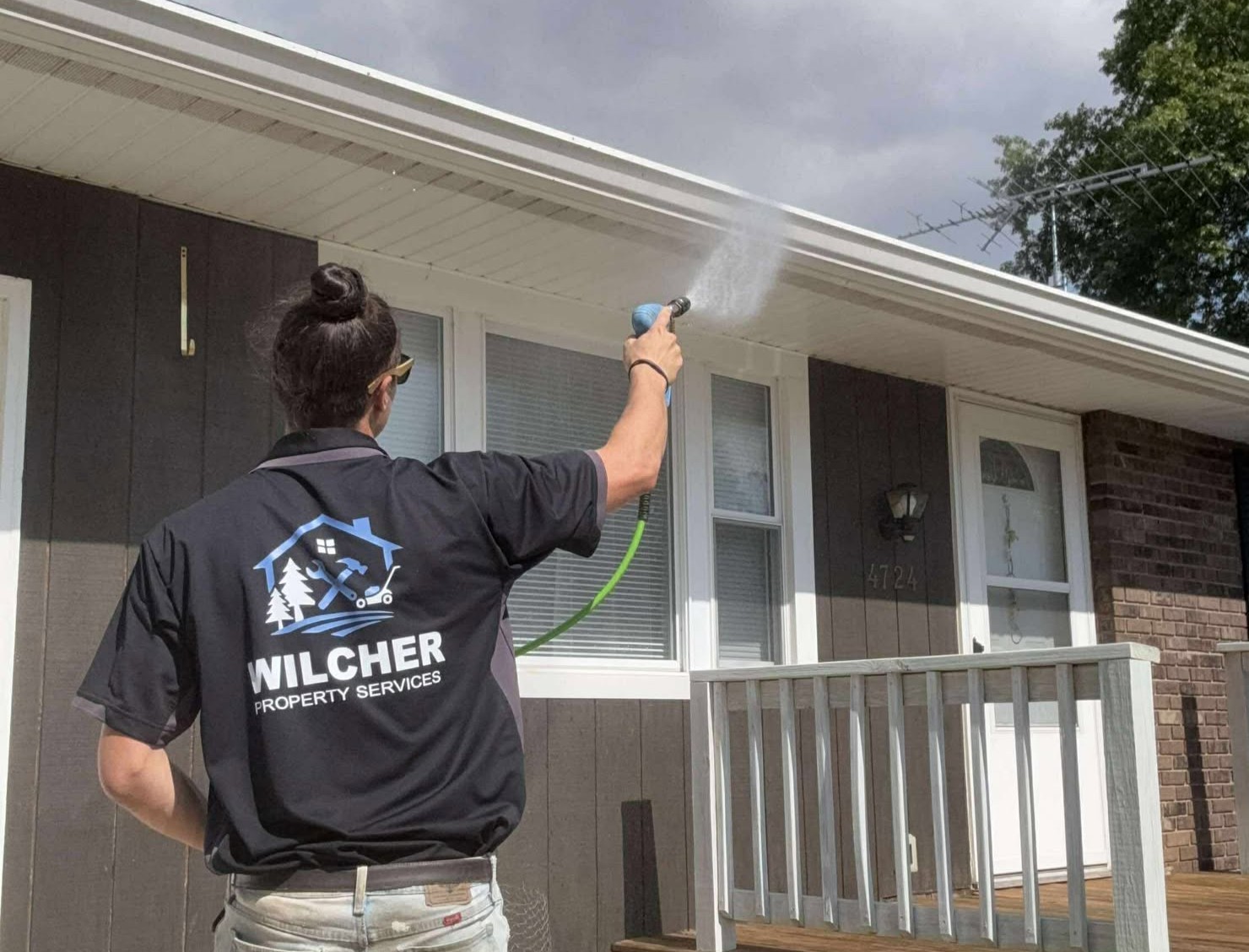 Kota, the owner, working