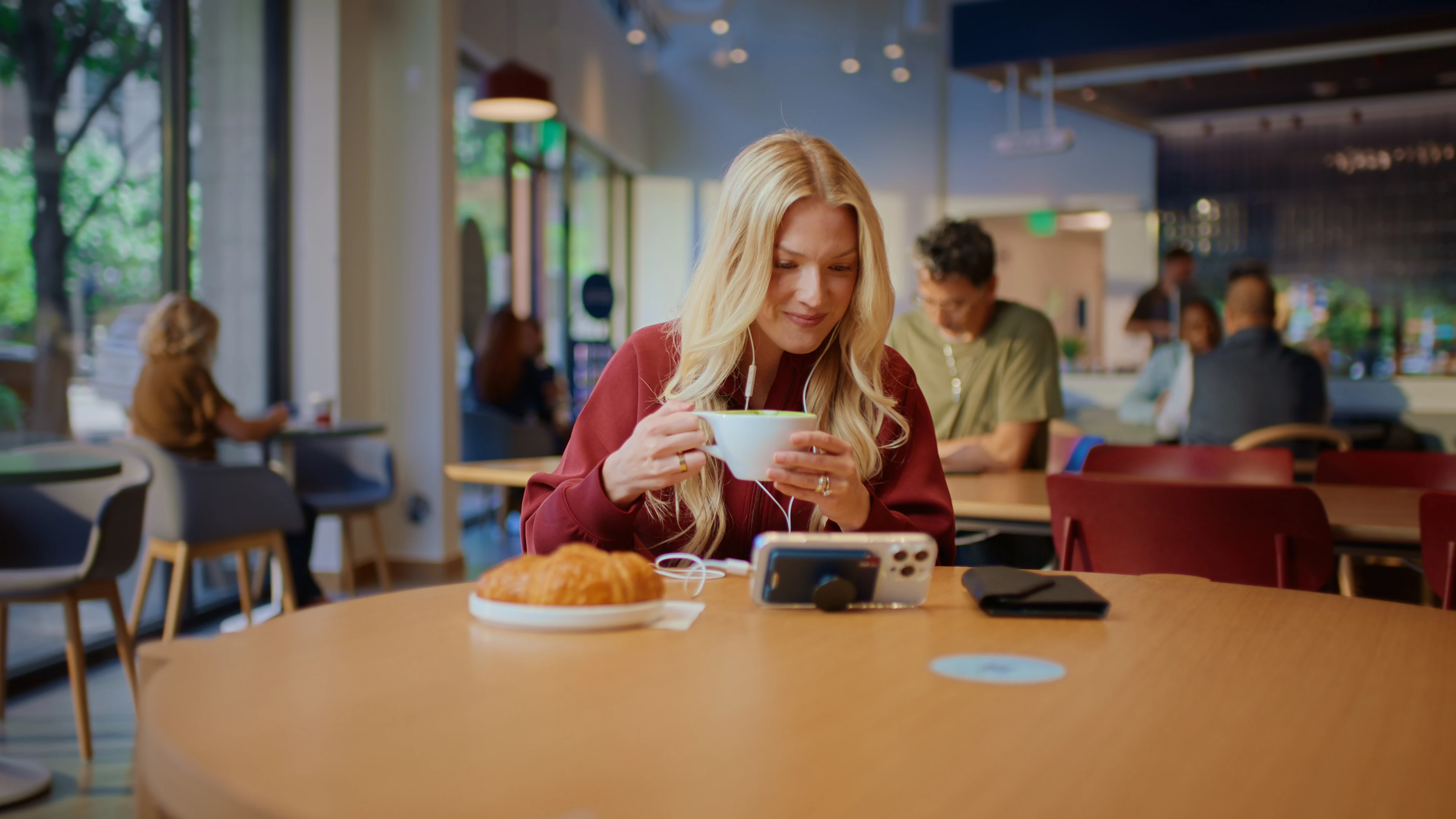 Women in cafe with latte