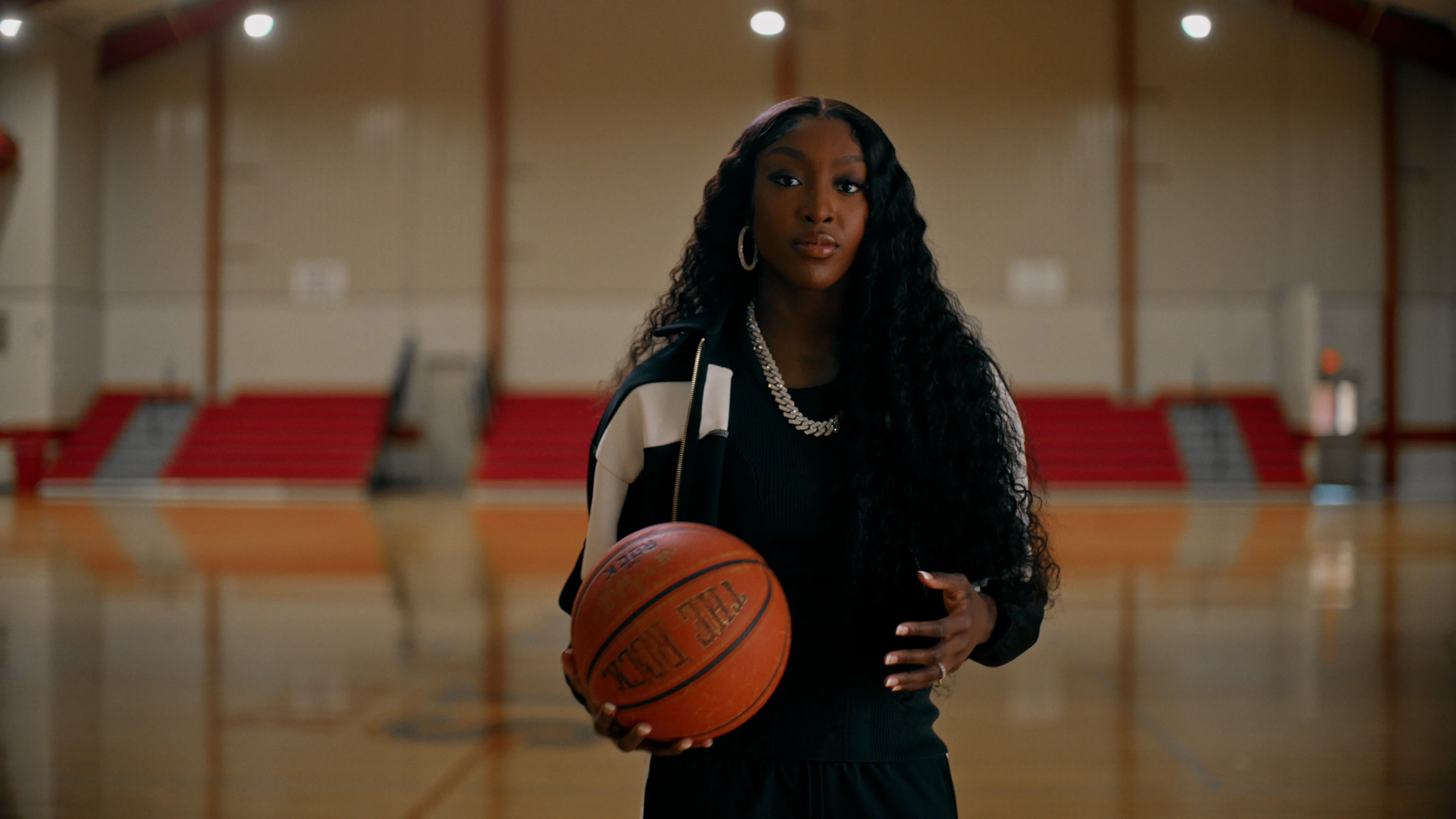 woman holding basketball