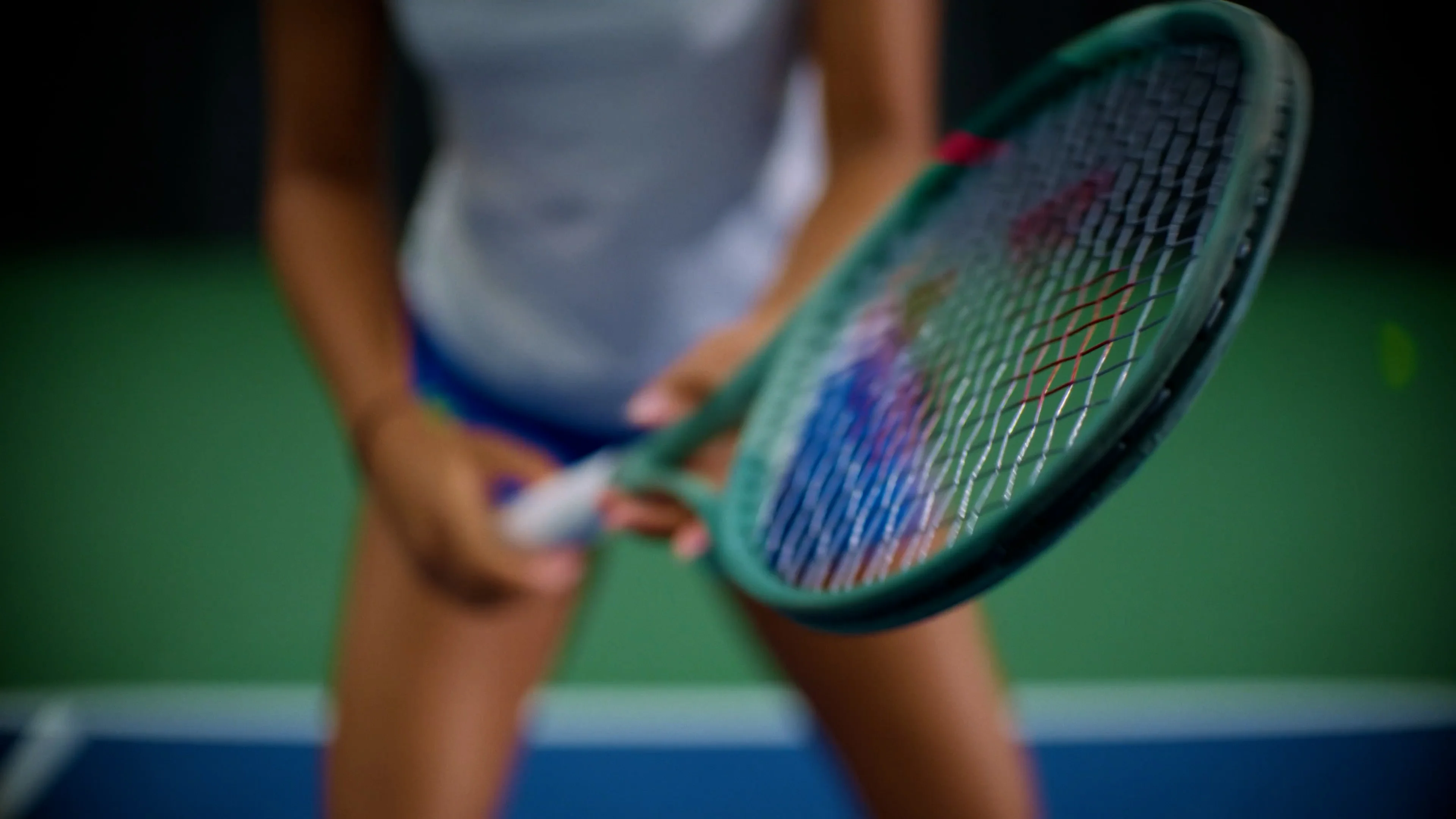 Woman holding tennis racquet