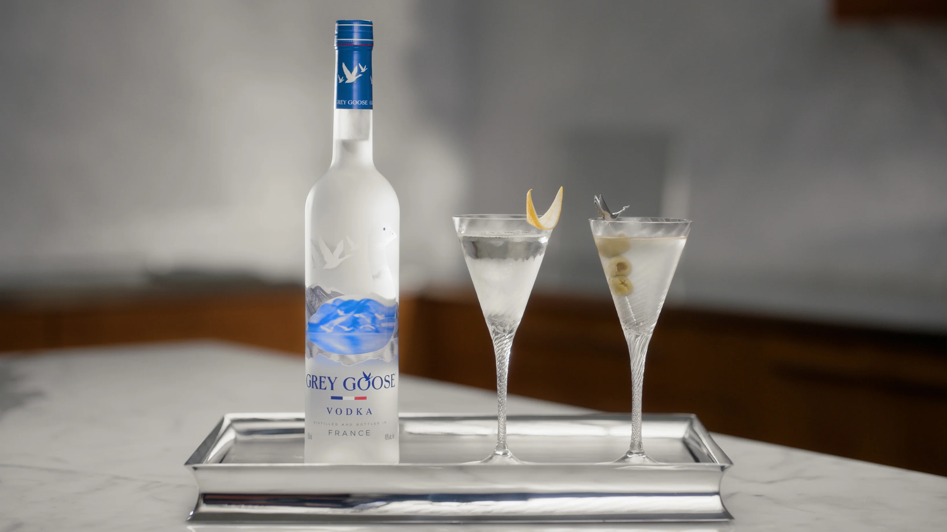 Two vodka cocktails on a serving tray