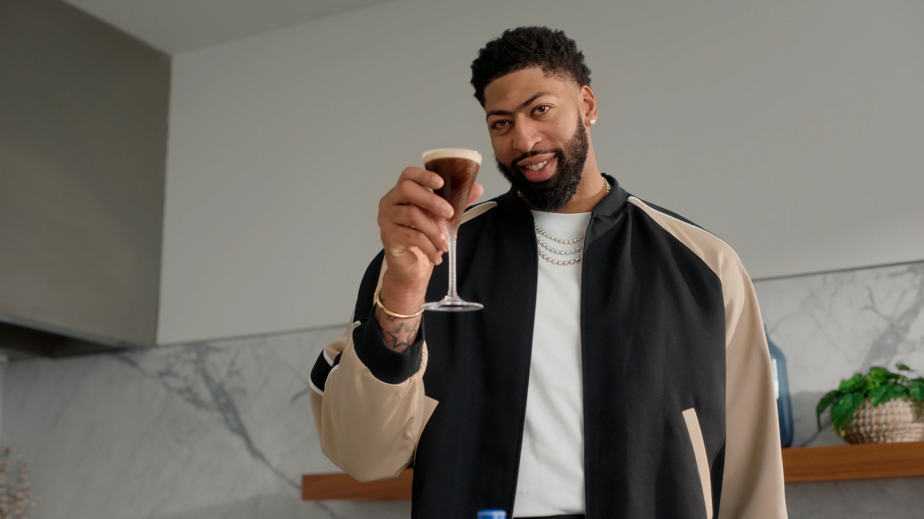 man holding a cocktail