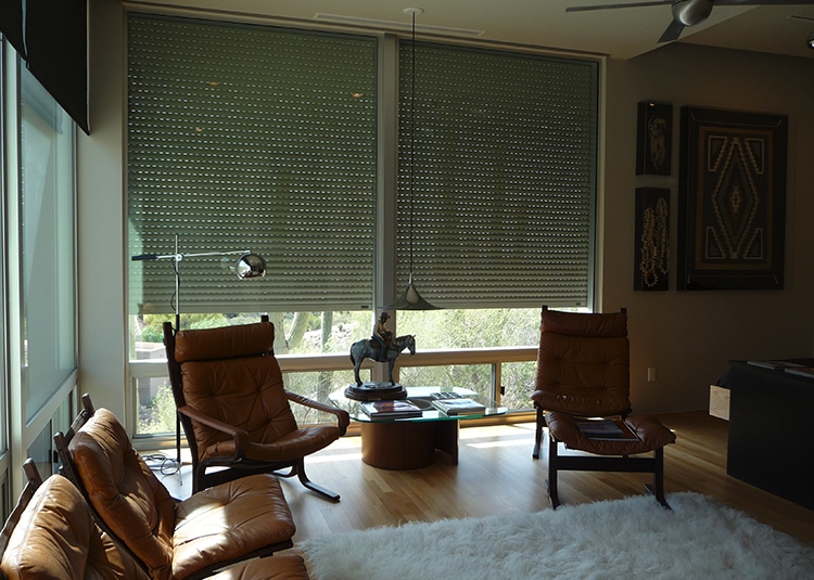 Modern living room with closed shutters.