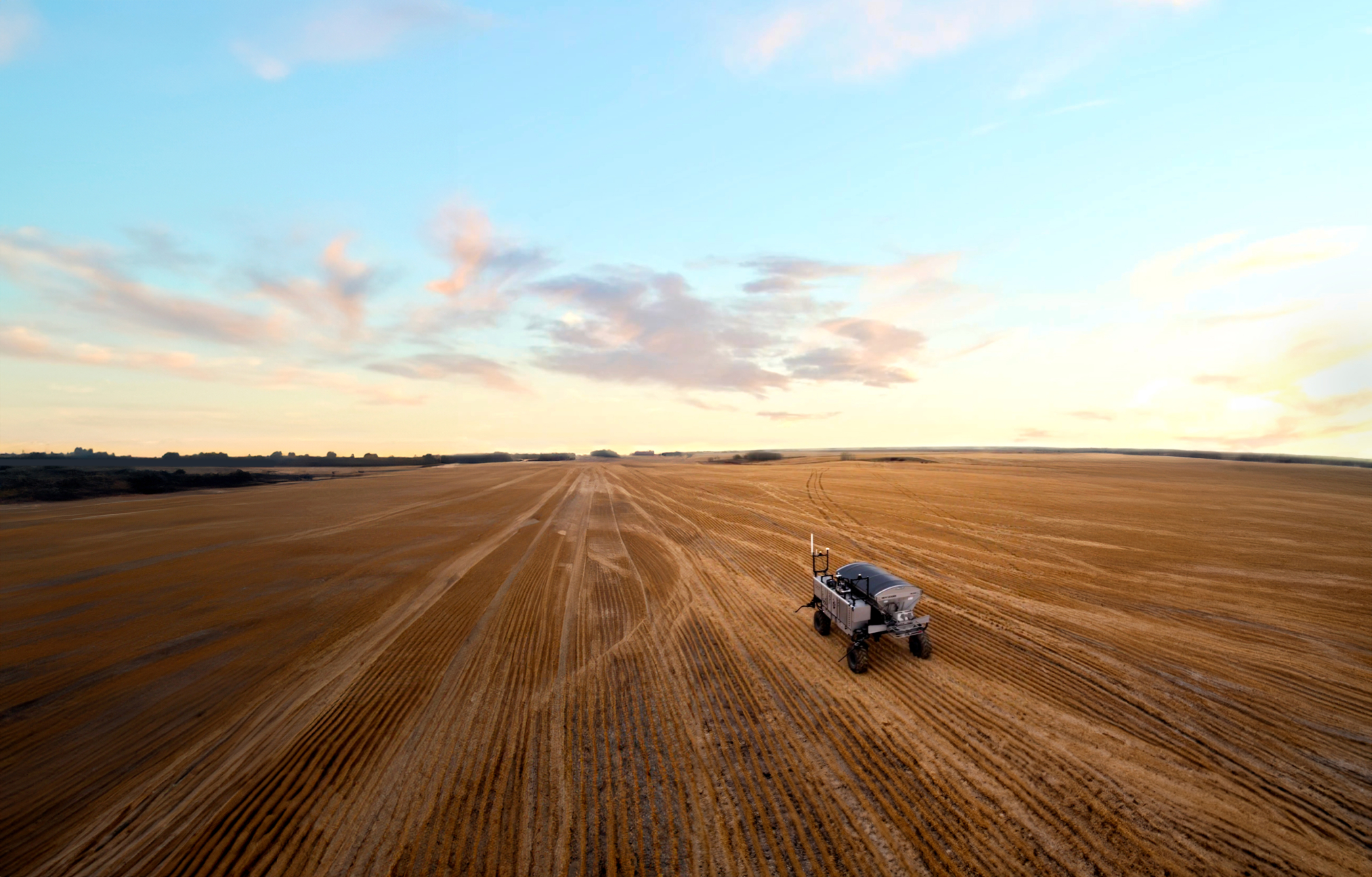 farm field with autonomous farming equipment in the Edmonton Region