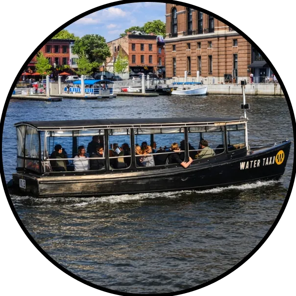 A boat full of people traveling down a river.