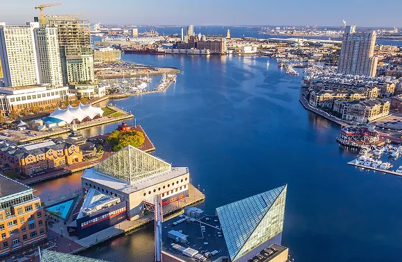 An aerial view of a city with a river running through it.