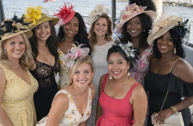 A group of women standing next to each other.
