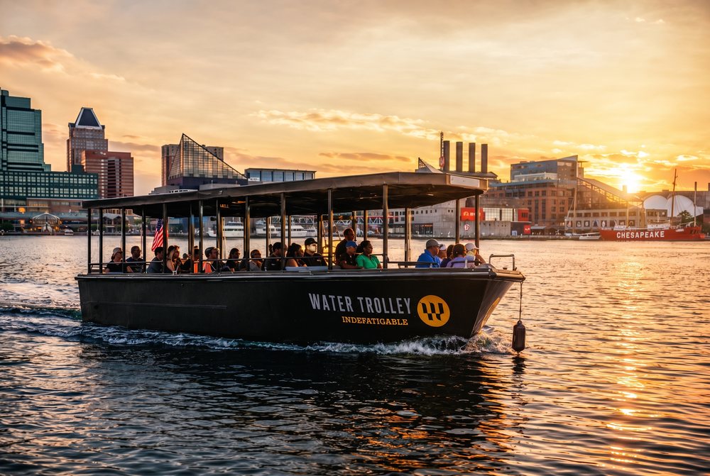 The Water Trolley full of riders at sunset