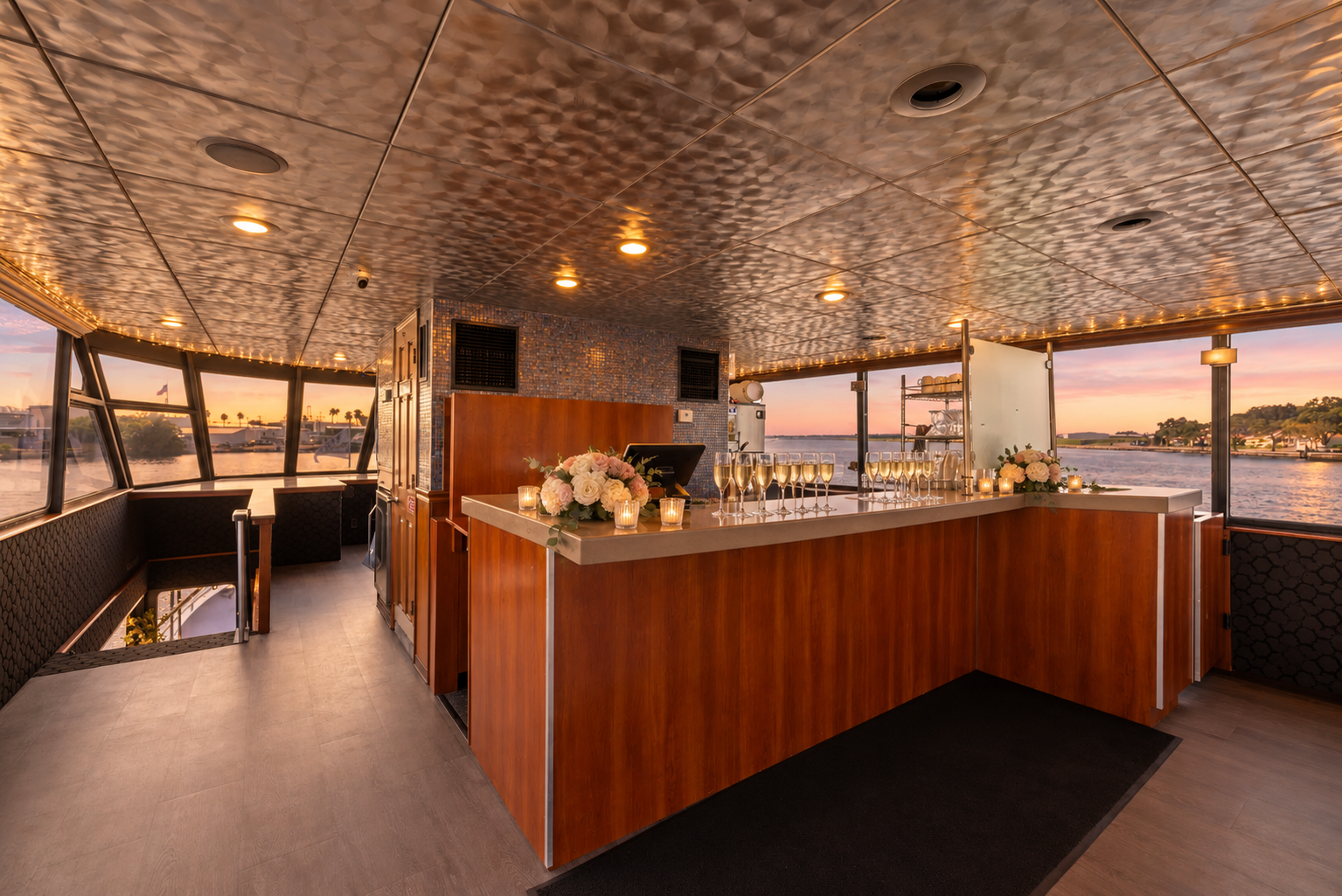 The Lady Thames bar with champagne flutes ready for a toast at sunset