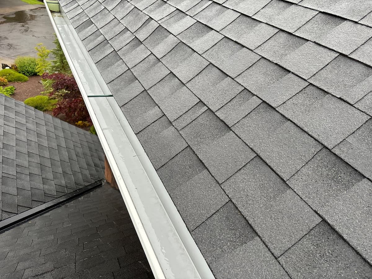 Gutter cleaning service results showing a empty gutter on a residential roof