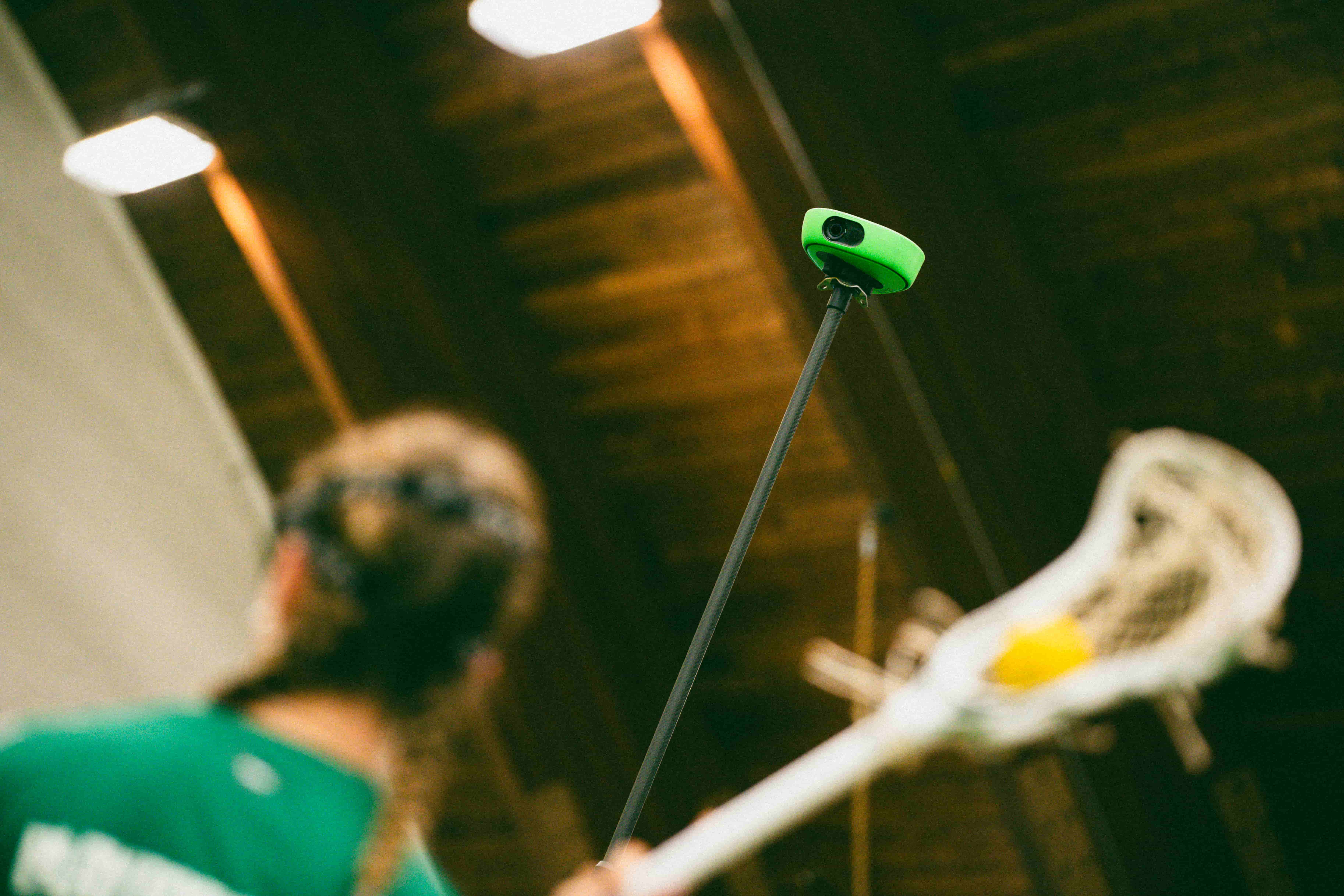 Youth lacrosse players in action on the field