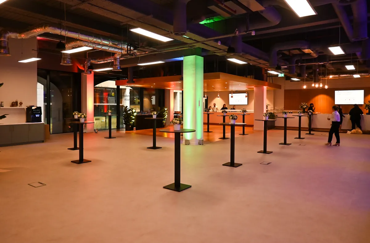 Open-plan exhibition space with poseur tables at a Cavendish Venues London venue
