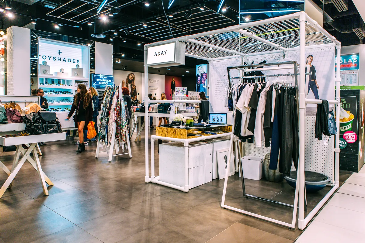 Pop-up shop fit-out with rails and display units in a London venue