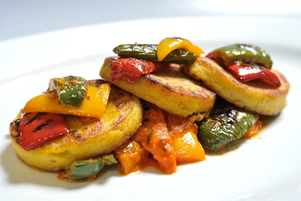Polenta and ratatouille plated by Mayfair Catering Services for a London event