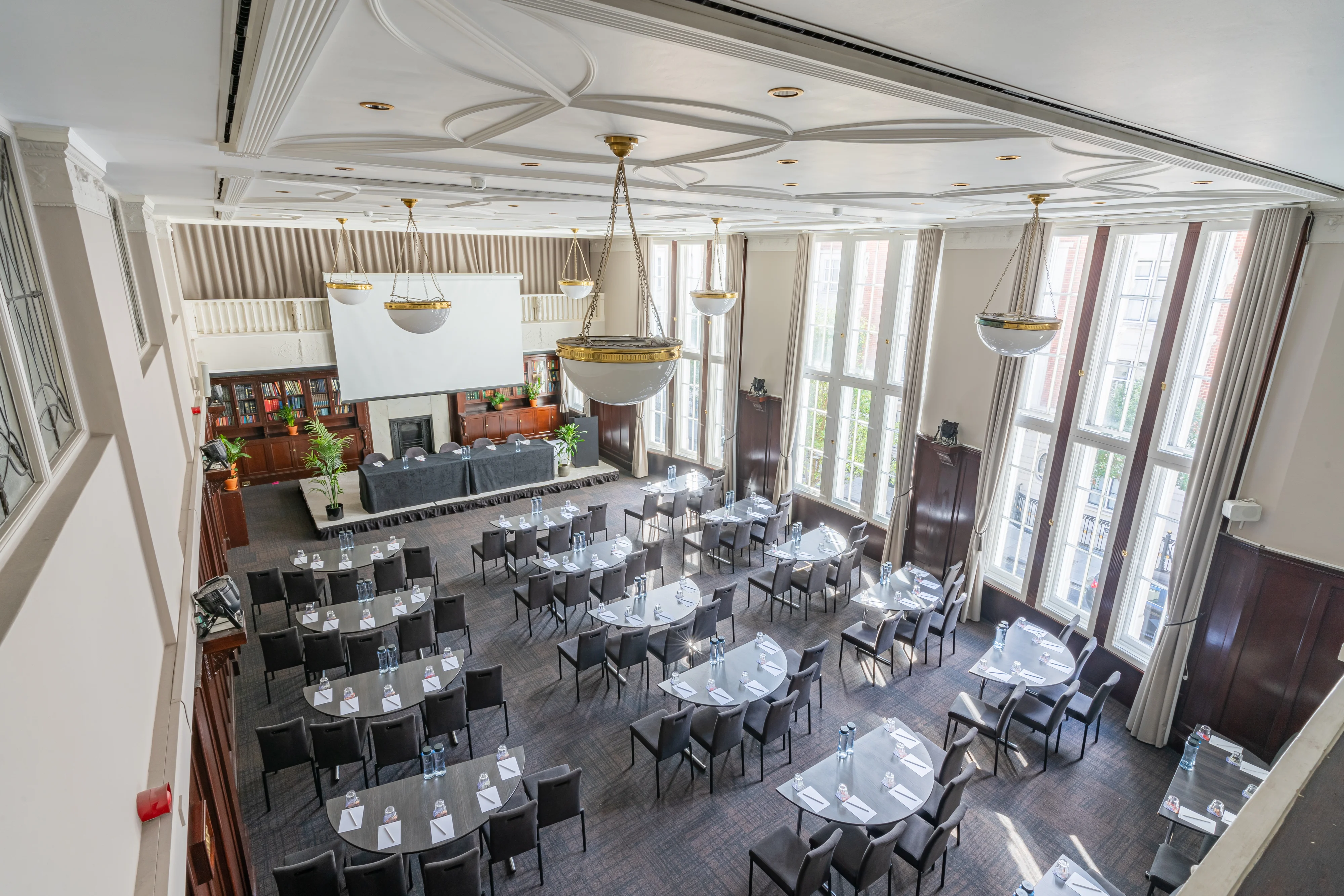 A wide view of the Council Chamber at 44 Hallam Street set out cabaret style